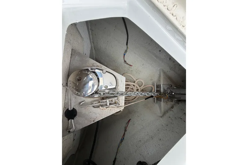 Slide: The Image of Anchor compartment of 2018 Crownline 285 SS boat with chain and rope. - 17