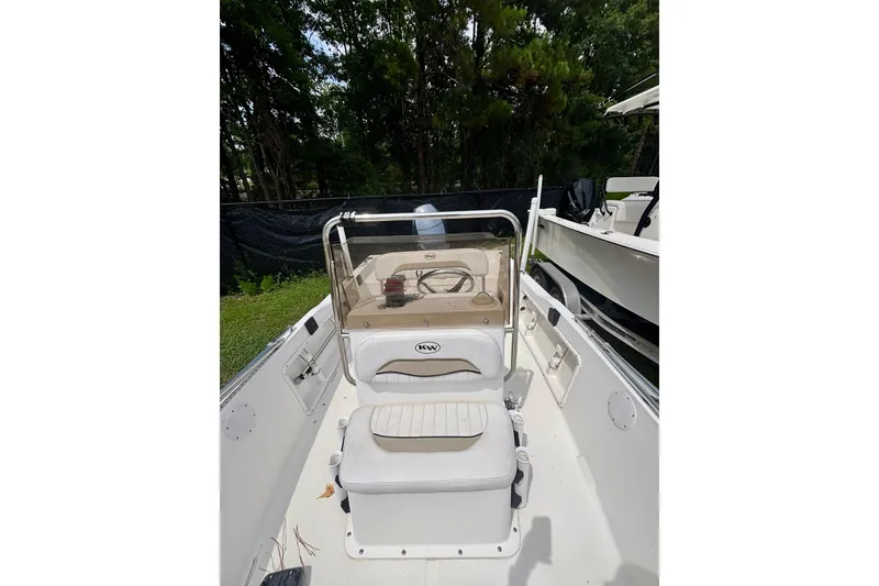 Slide: The Image of 2011 Key West 1720 Center Console boat interior with seating and console view. - 11