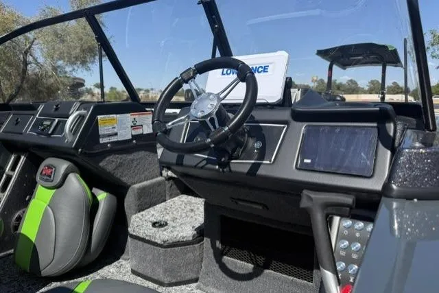 Slide: The Image of Interior of 2026 Ranger VX1888 WT boat with modern dashboard and steering wheel. - 8