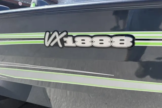 Slide: The Image of 2026 Ranger VX1888 WT boat with sleek green and white detailing. - 6