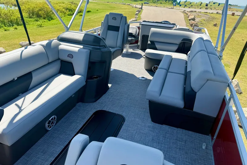 Slide: The Image of 2026 Sun Tracker Sportfish 24 XP3 pontoon boat interior with spacious seating and modern design. - 8