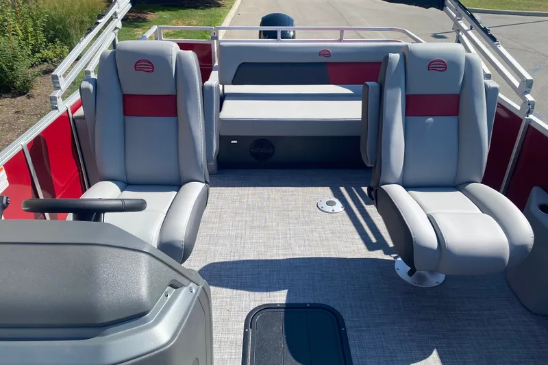 Slide: The Image of 2026 Sun Tracker Party Barge 22 RF XP3 interior with gray and red seating. - 9