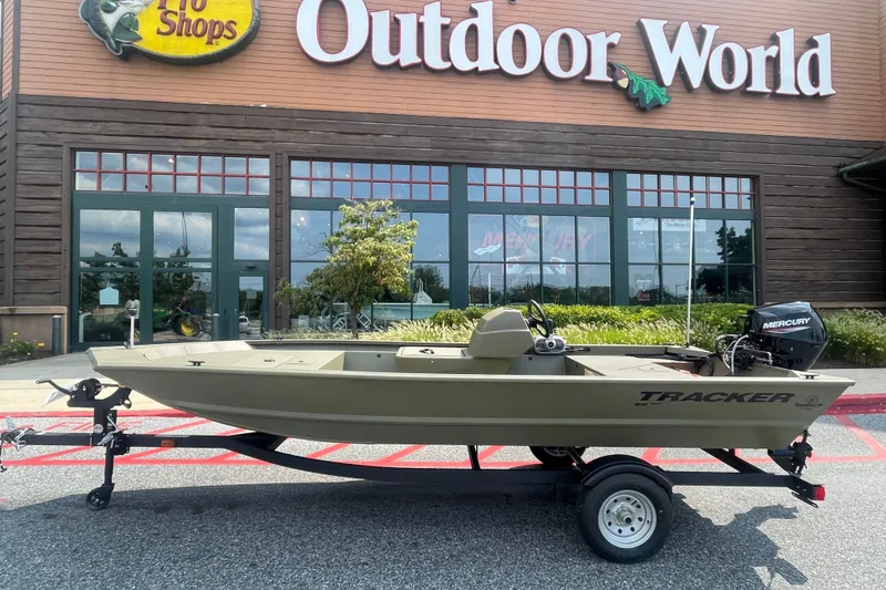 The Image of 2026 Tracker Grizzly 1648 SC boat outside Bass Pro Shops Outdoor World. - 0