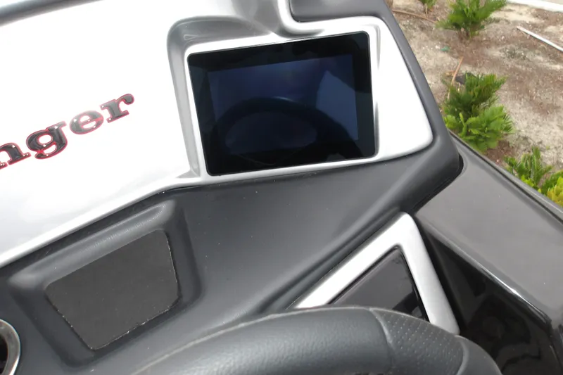 Slide: The Image of Dashboard of 2026 Ranger 220F boat with touchscreen display and steering wheel. - 25