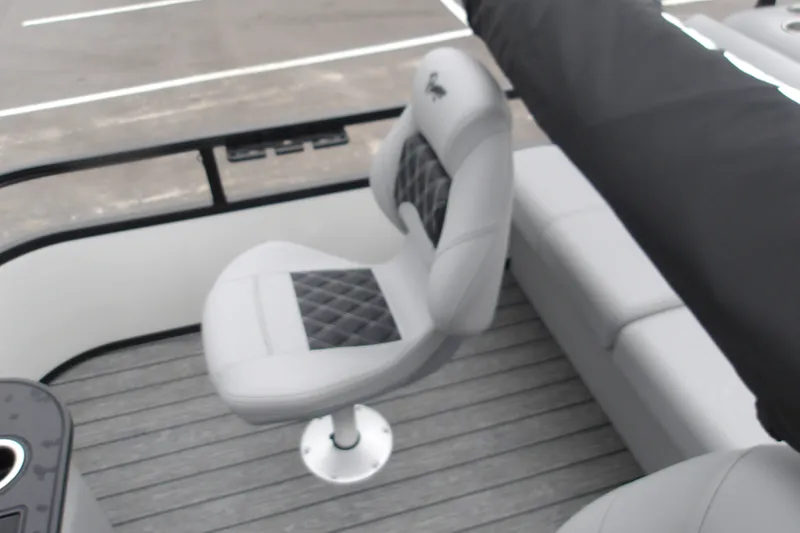 Slide: The Image of 2026 Ranger 220F boat interior with cushioned seating and modern design. - 21