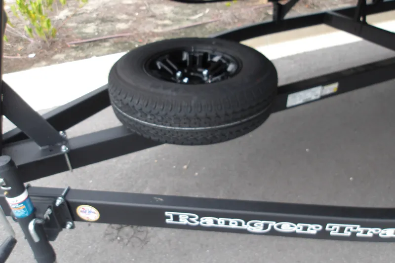 Slide: The Image of 2026 Ranger 220F trailer with spare tire mounted underneath. - 30