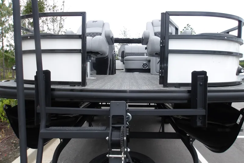 Slide: The Image of 2026 Ranger 220F pontoon boat with spacious seating and modern design. - 29