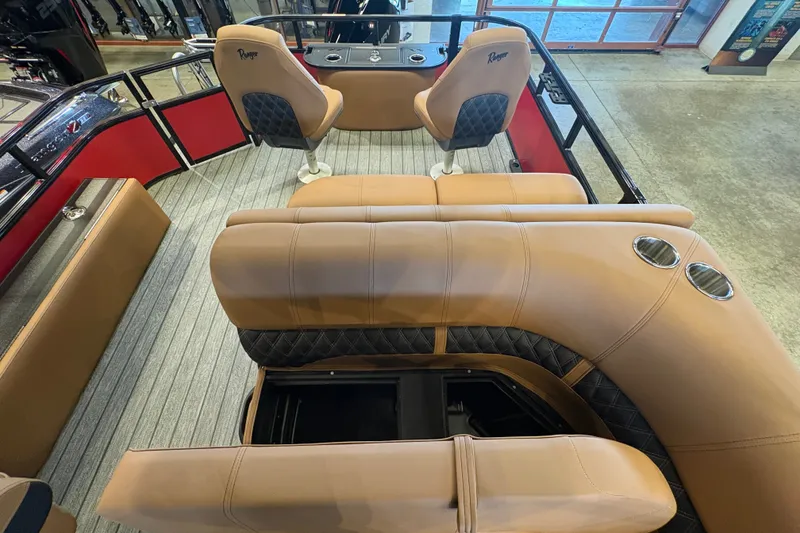 Slide: The Image of Luxurious interior of 2026 Ranger 223F boat with tan leather seating. - 13