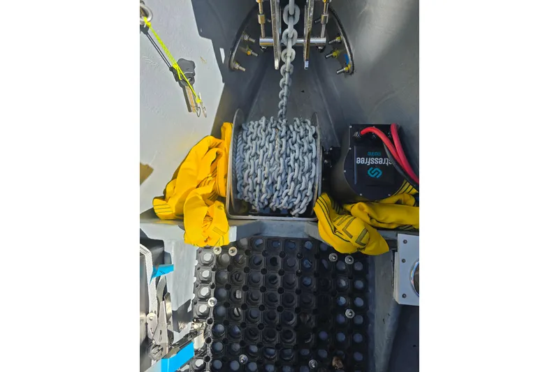 Slide: The Image of Interior view of 2025 Iguana Commuter boat showing anchor chain and equipment. - 10