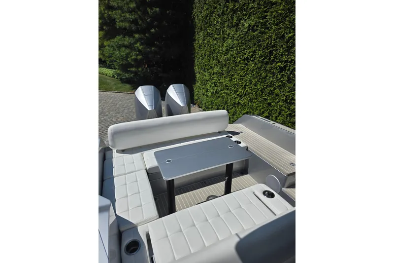 Slide: The Image of Luxury seating area on 2025 Iguana Commuter boat with sleek design and modern amenities. - 5