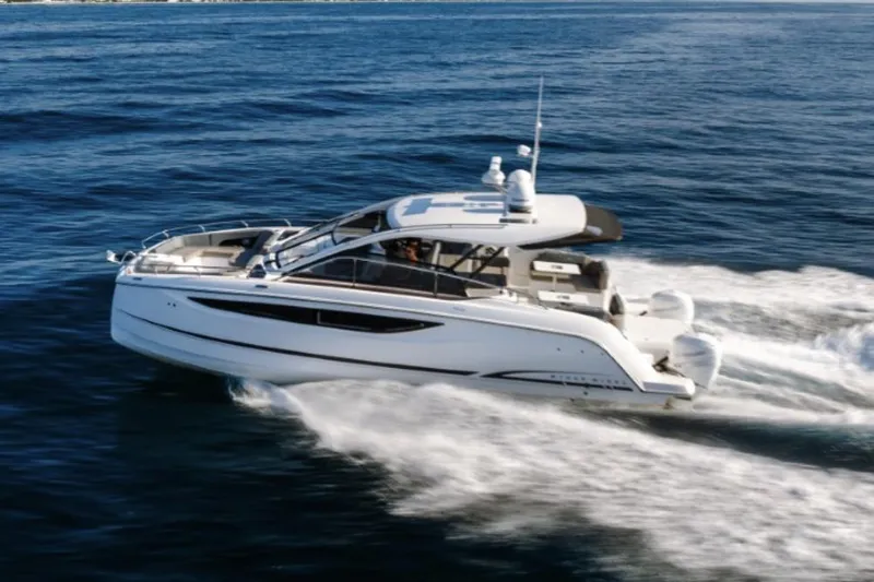Slide: The Image of Manufacturer Provided Image: 2025 Four Winns TH36 yacht cruising on open water, showcasing sleek design and powerful performance. - 41