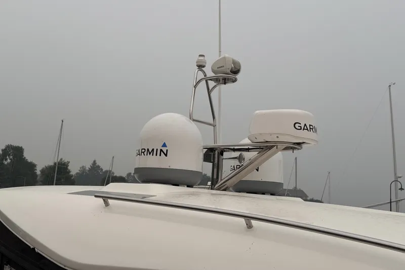 Slide: The Image of 2025 Four Winns TH36 boat with Garmin radar equipment on deck. - 9