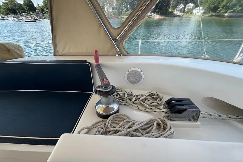 Slide: The Image of Cockpit of 2002 Passport 470 Center Cockpit sailboat with ropes and winch. - 33