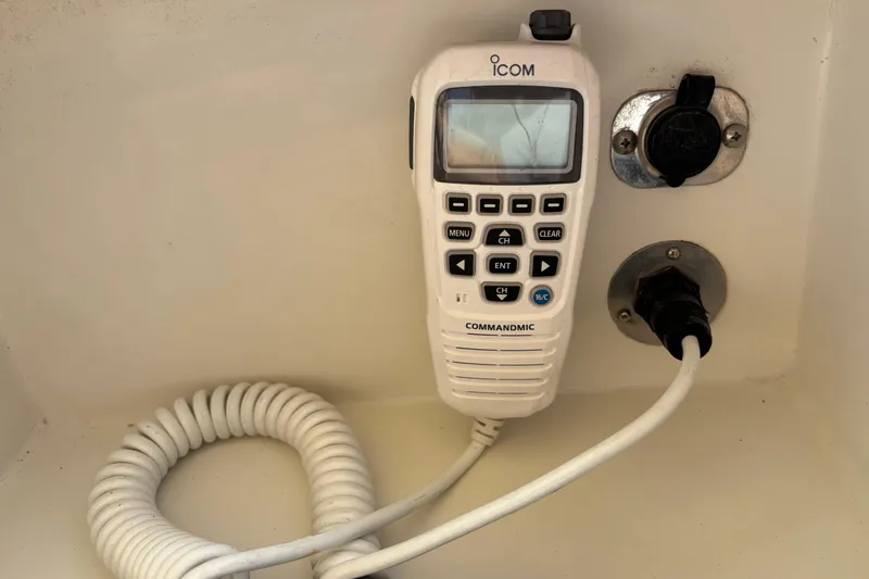Slide: The Image of ICOM CommandMic radio in a 2002 Passport 470 Center Cockpit yacht. - 27