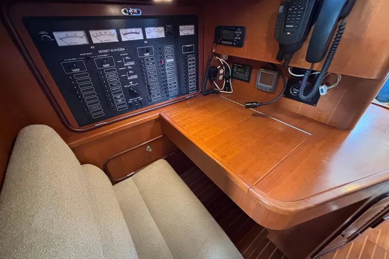 Slide: The Image of Control panel and navigation station in 2002 Passport 470 Center Cockpit yacht. - 47