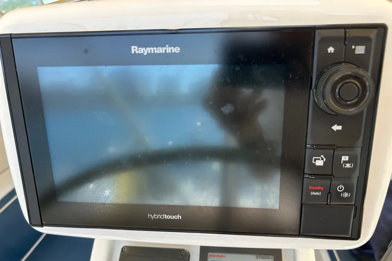Slide: The Image of Raymarine HybridTouch display on 2002 Passport 470 Center Cockpit yacht. - 24