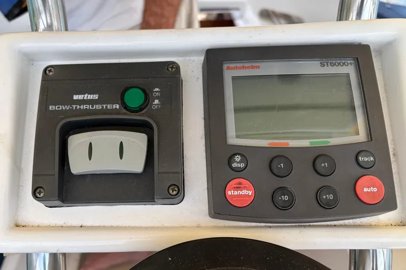 Slide: The Image of Control panel of a 2002 Passport 470 Center Cockpit with Vetus bow thruster and Autopilot. - 25