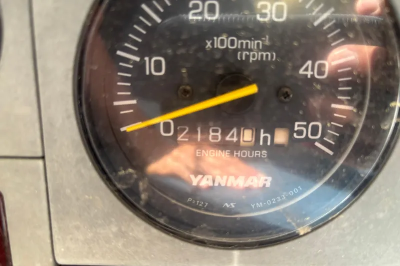 Slide: The Image of Yanmar engine hour meter showing 1840 hours on a 2002 Passport 470 Center Cockpit. - 82
