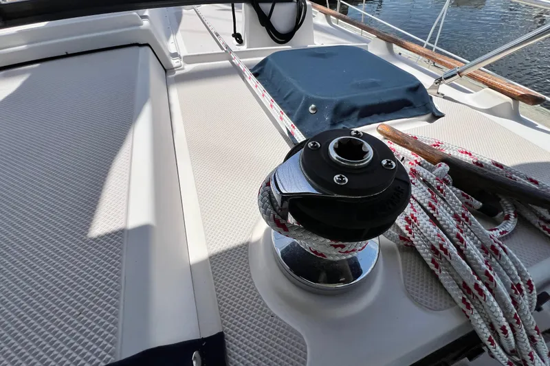 Slide: The Image of Deck of 1987 Island Packet SP Cruiser with winch and ropes. - 30