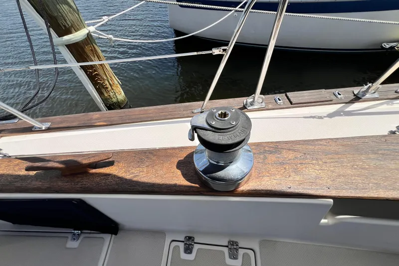 Slide: The Image of Deck of 1987 Island Packet SP Cruiser with winch and cleat. - 31