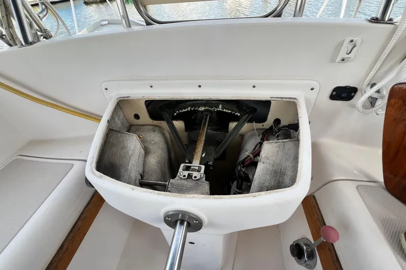 Slide: The Image of Cockpit view of 1987 Island Packet SP Cruiser sailboat, showcasing steering mechanism. - 24