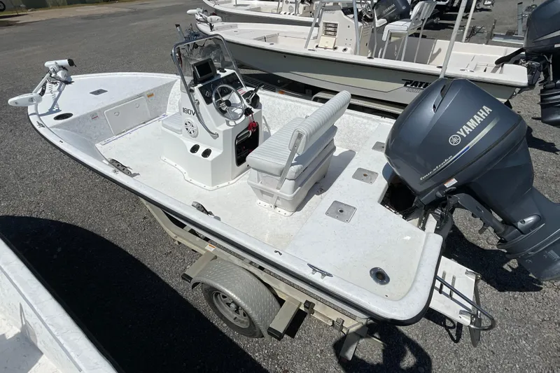 Slide: The Image of 2006 Kenner 180 VX boat with Yamaha outboard motor on a trailer. - 5
