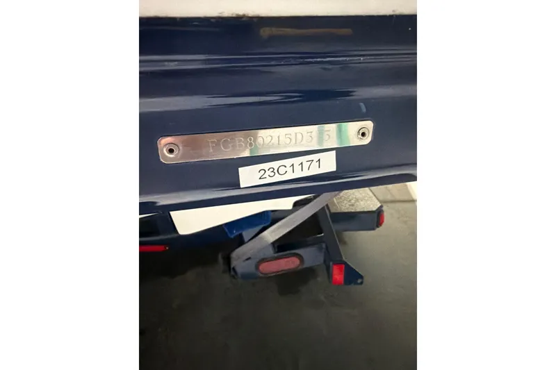Slide: The Image of 2013 Chaparral 224 Sunesta boat hull identification number and trailer detail. - 18