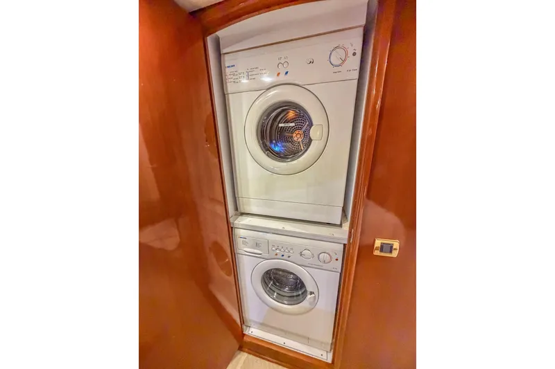 Slide: The Image of Stacked washer and dryer in 2005 Carver 56 Voyager yacht interior. - 21