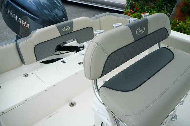 Slide: The Image of 2026 Key West 203 FS boat seating with Yamaha engine in background. - 22