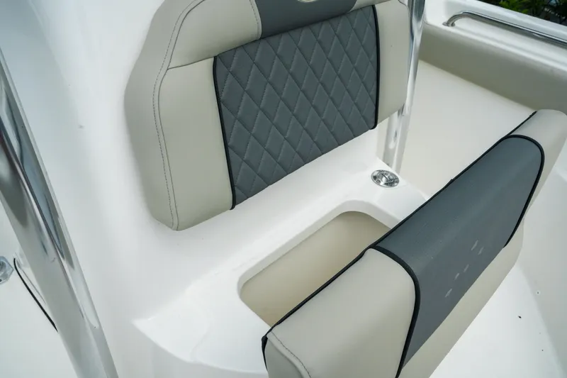 Slide: The Image of 2026 Key West 203 FS boat seat with gray and beige upholstery, featuring diamond stitching. - 19