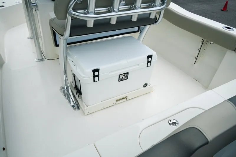 Slide: The Image of Interior of 2026 Key West 203 FS boat with cooler under seat. - 10