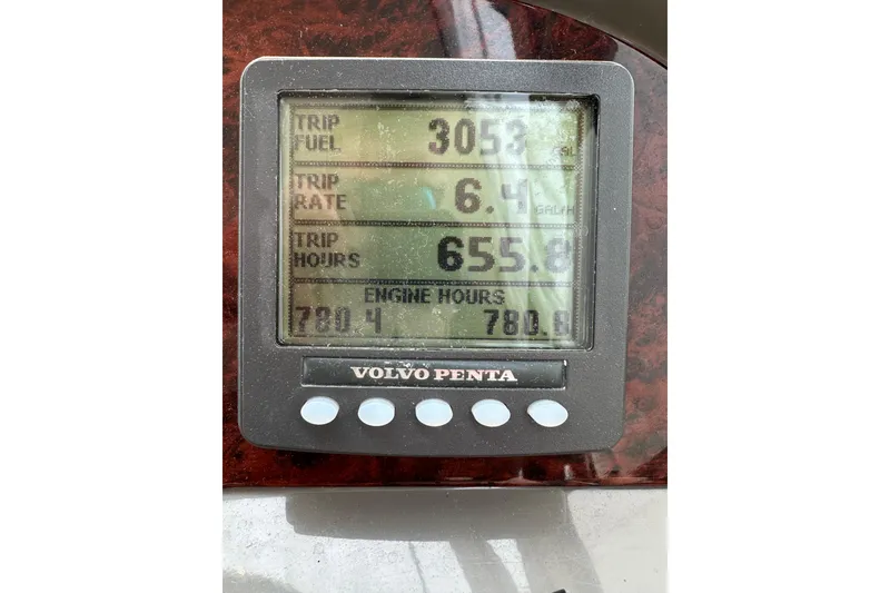 Slide: The Image of Volvo Penta display showing trip fuel, rate, and hours on Regal Commodore 4060, 2008 model. - 32