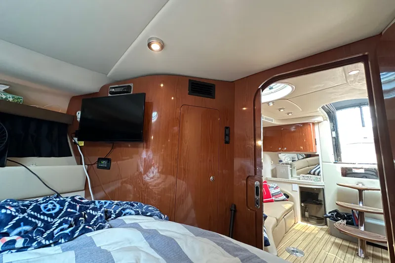 Slide: The Image of Interior of 2008 Regal Commodore 4060 yacht with cozy cabin and modern amenities. - 21