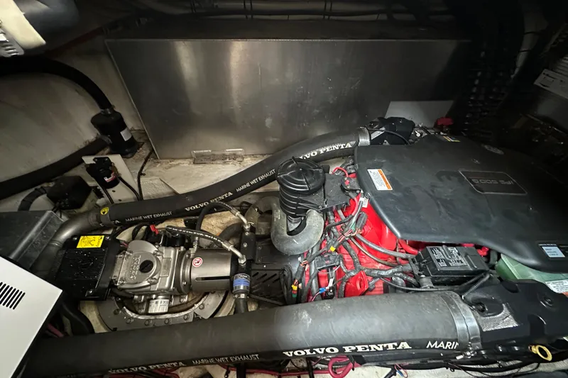 Slide: The Image of Engine compartment of a 2008 Regal Commodore 4060 with Volvo Penta components. - 30