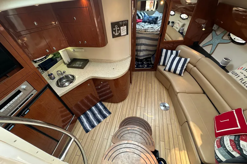 Slide: The Image of Luxurious interior of 2008 Regal Commodore 4060 yacht with modern kitchen and cozy seating. - 13