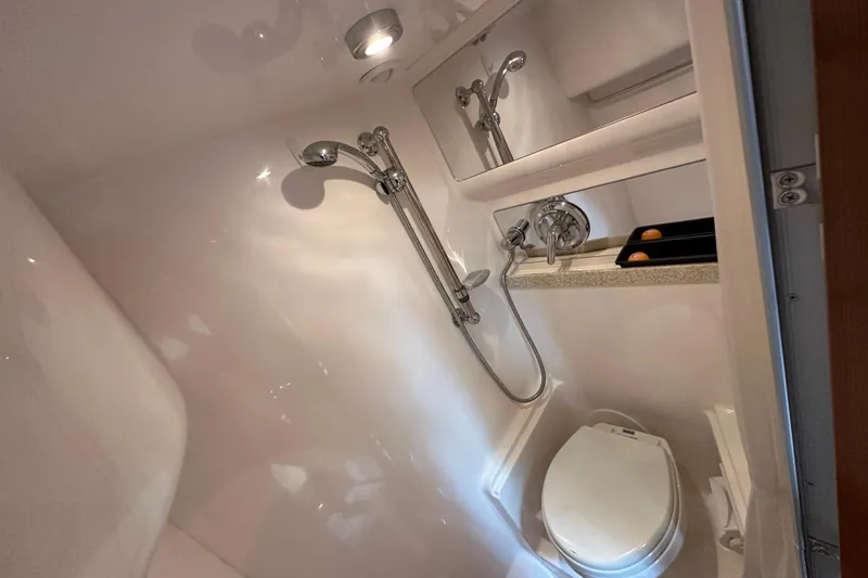 Slide: The Image of Compact bathroom in 2008 Regal Commodore 4060 yacht with shower and toilet. - 28