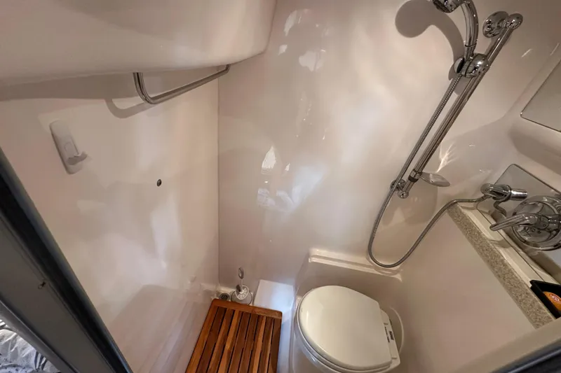 Slide: The Image of Compact bathroom in 2008 Regal Commodore 4060 yacht with shower and toilet. - 29