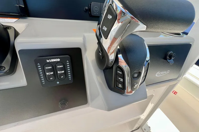 Slide: The Image of Control panel of 2026 Robalo 246 Cayman boat with Lenco and Yamaha controls. - 18