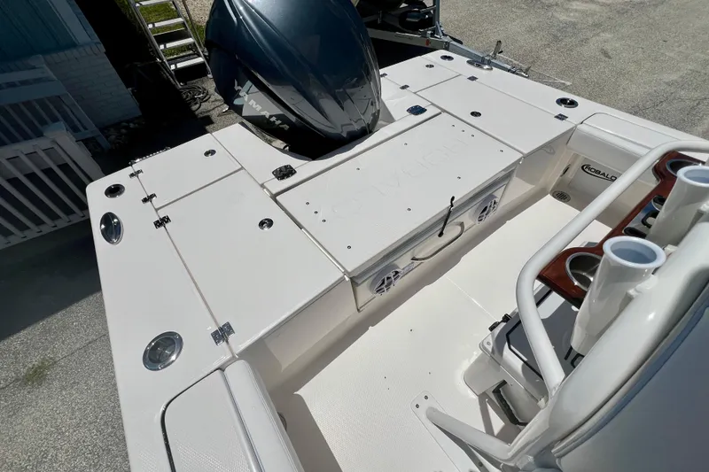 Slide: The Image of 2026 Robalo 246 Cayman boat deck with Yamaha engine and seating area. - 8