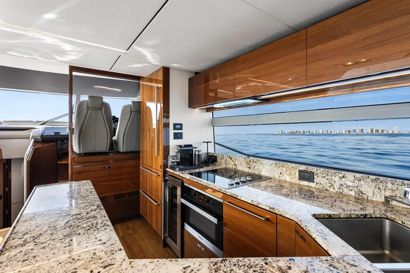 Slide: The Image of Luxurious 2018 Princess Y75 yacht kitchen with granite countertops and ocean view. - 15