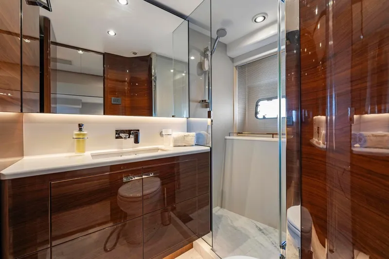 Slide: The Image of Luxurious bathroom in 2018 Princess Y75 yacht with sleek wood finishes and modern fixtures. - 42