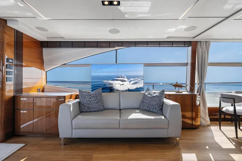 Slide: The Image of Luxurious interior of 2018 Princess Y75 yacht with ocean view through large windows. - 12