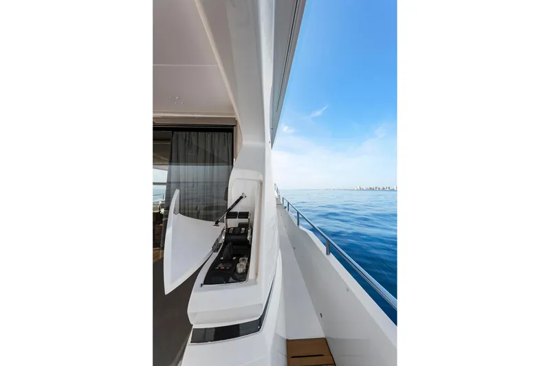 Slide: The Image of Side view of 2018 Princess Y75 yacht with ocean backdrop. - 52