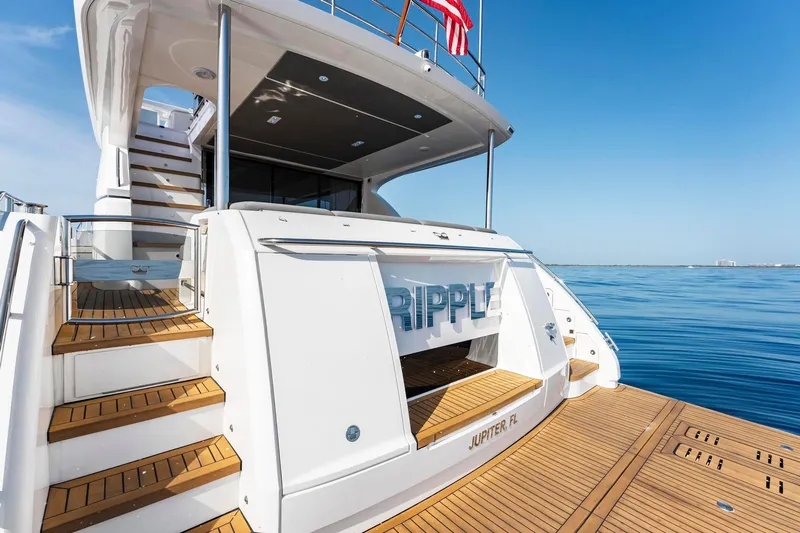 Slide: The Image of Luxury Princess Y75 yacht, 2018 model, docked with elegant wooden deck and ocean view. - 48