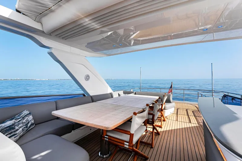 Slide: The Image of Luxurious 2018 Princess Y75 yacht deck with elegant seating and ocean view. - 58