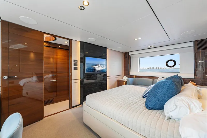 Slide: The Image of Luxurious interior of 2018 Princess Y75 yacht with elegant bedroom and scenic window view. - 24