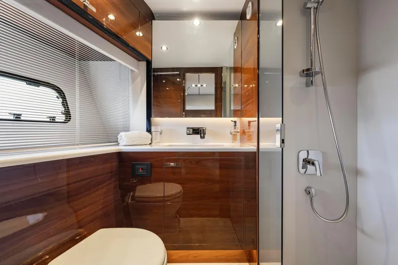 Slide: The Image of Luxurious bathroom interior on 2018 Princess Y75 yacht with modern fixtures and wooden accents. - 45