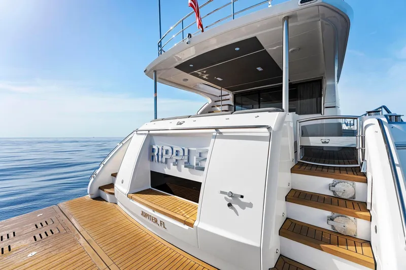 Slide: The Image of Luxury yacht Princess Y75, 2018 model, docked with wooden deck and elegant design. - 47
