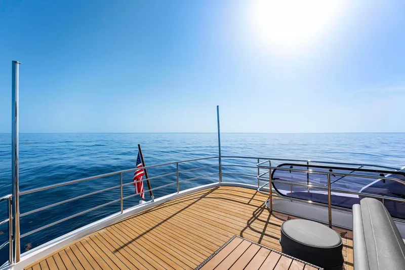 Slide: The Image of Luxurious 2018 Princess Y75 yacht deck with ocean view and American flag. - 55