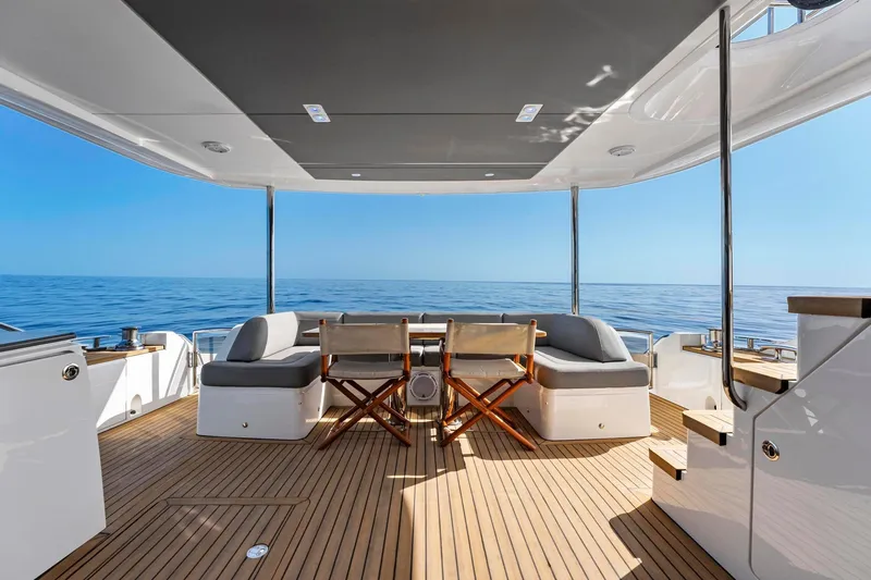 Slide: The Image of Luxurious 2018 Princess Y75 yacht deck with seating, ocean view, and elegant design. - 49